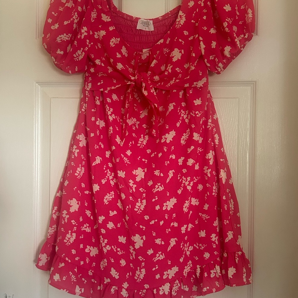 Pink/white mini dress with ruffle hem